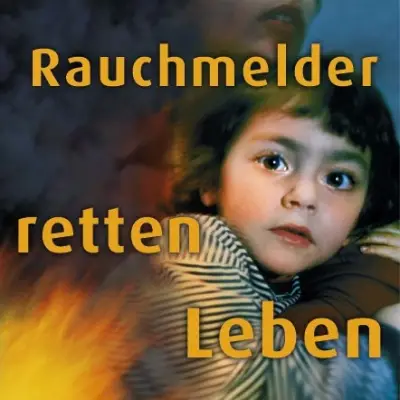 Kampagnenmotiv „Rauchmelder retten Leben“ mit einem Kindergesicht vor Flammen